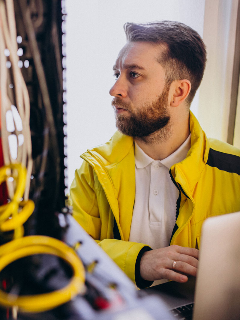 young-man-engineer-making-program-analyses